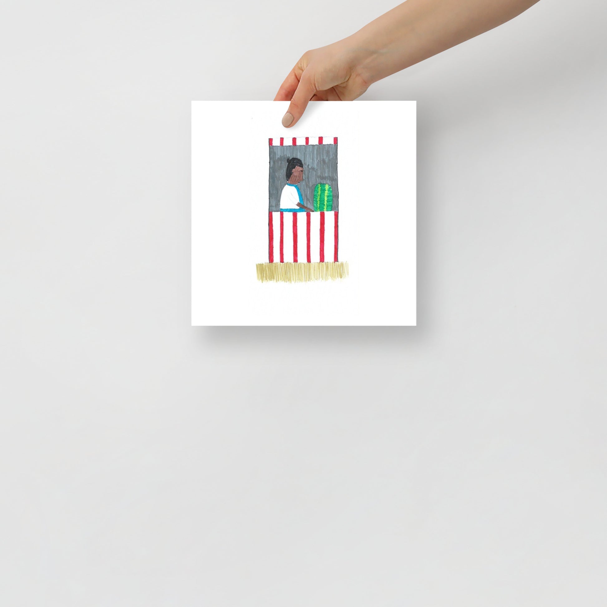 This image shows an art print of a minimalist illustration. The artwork depicts a person inside a red and white striped market stall conveying a cheerful tone.