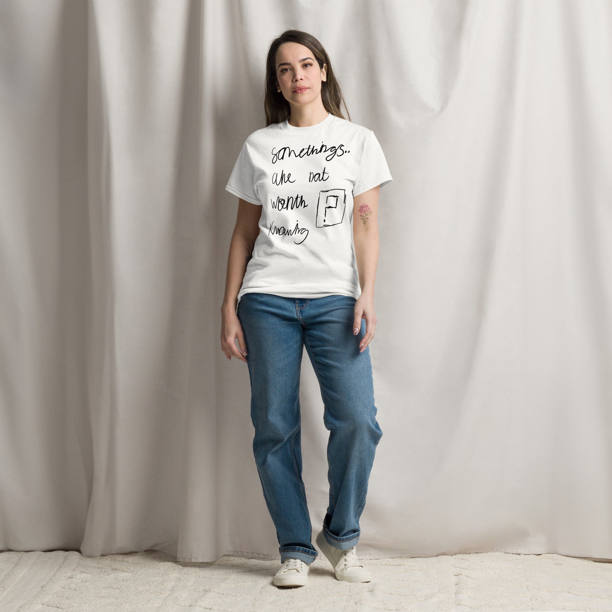 This image shows a white graphic t-shirt featuring the phrase "Somethings are not worth knowing